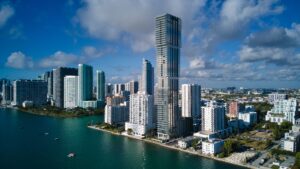 Scenic view of the Miami Edgewater skyline featuring modern skyscrapers along the waterfront, highlighting the urban landscape relevant to industrial cleaning services in Florida.